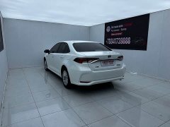 Toyota Corolla 2021 Hybrid 1.8L E-CVT Elite - ფოტო 8