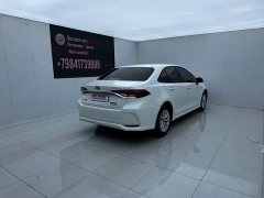 Toyota Corolla 2021 Hybrid 1.8L E-CVT Elite - ფოტო 9