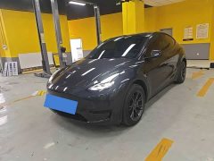 Tesla Model Y Rear-Wheel Drive - ფოტო 1
