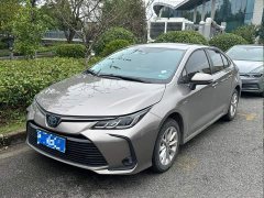 Toyota Corolla 2021 Hybrid 1.8L E-CVT Elite - ფოტო 1