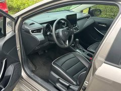 Toyota Corolla 2021 Hybrid 1.8L E-CVT Elite - ფოტო 4