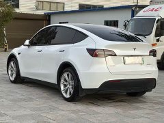 Tesla Model Y Standard Range RWD - ფოტო 9