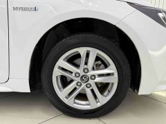 Toyota Corolla Hybrid 1.8H E-CVT Luxury - ფოტო 20