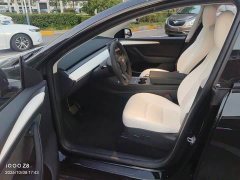 Tesla Model Y Standard Range RWD - ფოტო 9