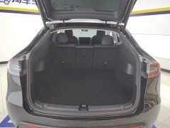 Tesla Model Y Standard Range RWD - ფოტო 4