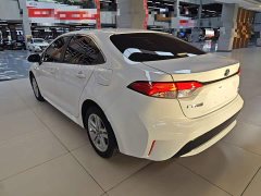 Toyota Corolla Hybrid 1.8H E-CVT Luxury - ფოტო 5