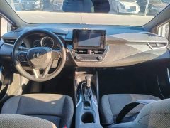 Toyota Corolla Hybrid 1.8H E-CVT Base - ფოტო 10