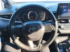 Toyota Corolla Hybrid 1.8H E-CVT Base - ფოტო 11