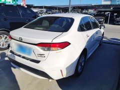 Toyota Corolla Hybrid 1.8H E-CVT Base - ფოტო 7