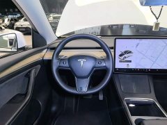 Tesla Model Y Standard Range RWD - ფოტო 11