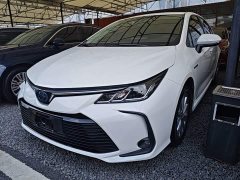 Toyota Corolla Hybrid 1.8L E-CVT Elite - ფოტო 1