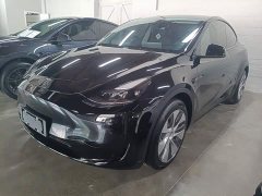 Tesla Model Y Rear-Wheel Drive - ფოტო 1
