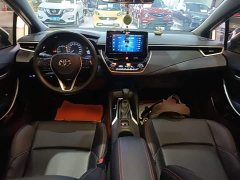 Toyota Corolla Hybrid 1.8H E-CVT Luxury - ფოტო 10
