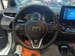 Toyota Corolla Hybrid 1.8H E-CVT Luxury - ფოტო 11