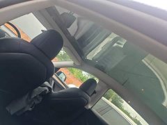 Tesla Model Y Rear-Wheel Drive - ფოტო 18