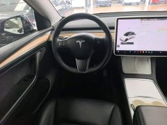 Tesla Model Y Standard Range RWD - ფოტო 11