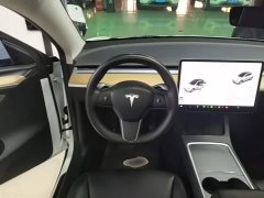 Tesla Model Y Standard Range RWD - ფოტო 11