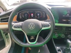 Volkswagen Bora 200TSI DSG Comfort Pro - ფოტო 11