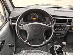 Wuling Zhiguang 2023 1.5L Practical 5/7-seater - ფოტო 11