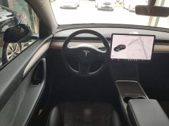 Tesla Model Y Standard Range RWD - ფოტო 11