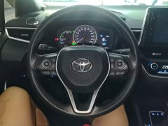Toyota Corolla 2021 Hybrid 1.8H E-CVT Luxury - ფოტო 11