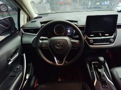 Toyota Corolla 2021 Hybrid 1.8L E-CVT Elite - ფოტო 11