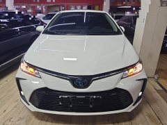 Toyota Corolla 2021 Hybrid 1.8L E-CVT Elite - ფოტო 3