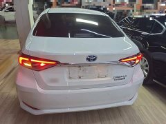 Toyota Corolla 2021 Hybrid 1.8L E-CVT Elite - ფოტო 6