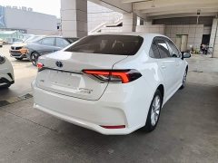 Toyota Corolla Hybrid 1.8L E-CVT Elite - ფოტო 7