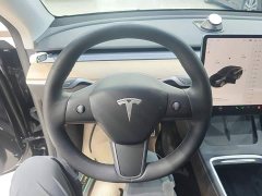 Tesla Model Y Standard Range RWD - ფოტო 11