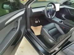 Tesla Model Y Rear-Wheel Drive - ფოტო 16