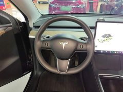 Tesla Model Y Standard Range RWD - ფოტო 11