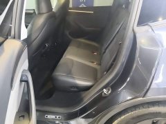 Tesla Model Y Rear-Wheel Drive - ფოტო 17