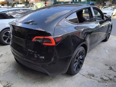 Tesla Model Y Standard Range RWD - ფოტო 7