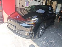 Tesla Model Y Standard Range RWD - ფოტო 1