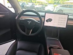 Tesla Model Y Standard Range RWD - ფოტო 11