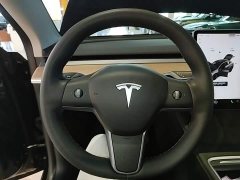 Tesla Model Y Standard Range RWD - ფოტო 11