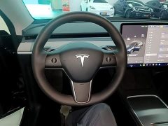 Tesla Model Y Rear-Wheel Drive - ფოტო 11