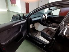Tesla Model Y Rear-Wheel Drive - ფოტო 16