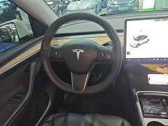 Tesla Model Y Standard Range RWD - ფოტო 11