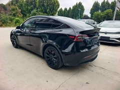 Tesla Model Y Standard Range RWD - ფოტო 4