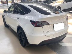 Tesla Model Y Standard Range RWD - ფოტო 11