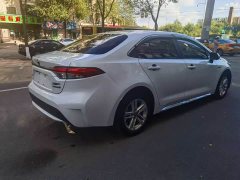 Toyota Corolla Hybrid 1.8H E-CVT Base - ფოტო 6