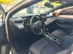 Toyota Corolla Hybrid 1.8H E-CVT Base - ფოტო 8
