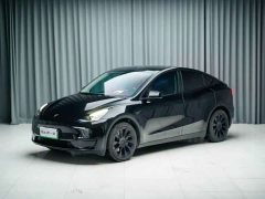 Tesla Model Y Rear-Wheel Drive - ფოტო 1