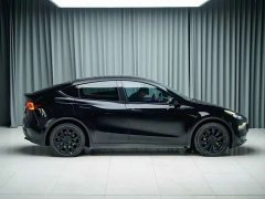 Tesla Model Y Rear-Wheel Drive - ფოტო 4