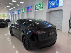Tesla Model Y Standard Range RWD - ფოტო 4