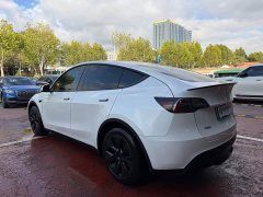 Tesla Model Y Rear-Wheel Drive - ფოტო 4