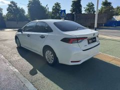 Toyota Corolla 2021 Hybrid 1.8L E-CVT Elite - ფოტო 6