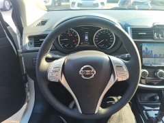 Nissan Qida TIIDA 1.6L CVT Smart Edition - ფოტო 11